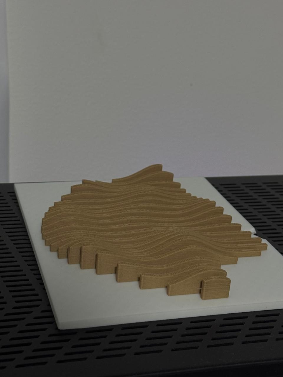 Topografía paramétrica impresa en 3D en PLA gold