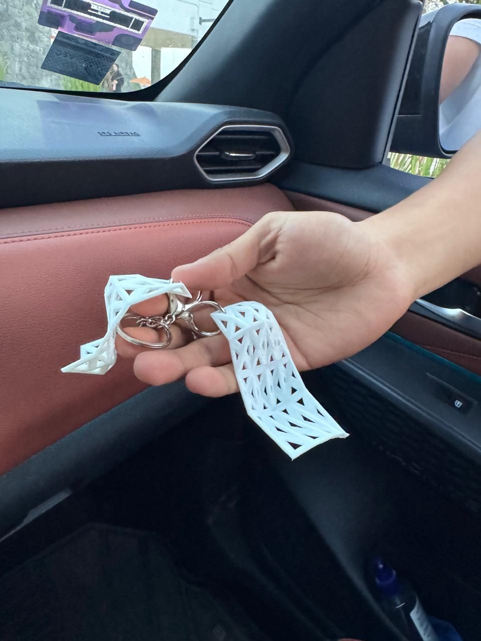 Llaveros paramétricos impresos en 3D en PLA flexible